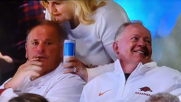Razorbacks Sam Pittman with Bobby Petrino at basketball game with Duke